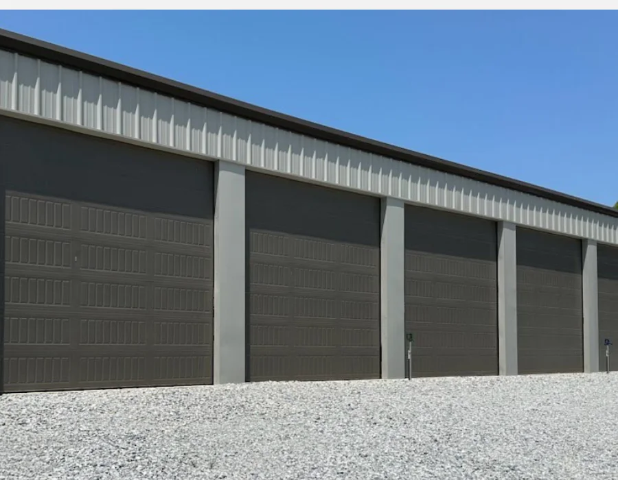 A row of tall enclosed storage bays at Belle Pointe Executive Storage